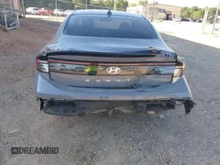 2025 Hyundai Sonata SEL with VIN KMHL64JA0SA452355, listed as a IAAI auction lot 42442856 with 11,906 mi miles and . Bid and sale history available at DreamBid. Image 6.