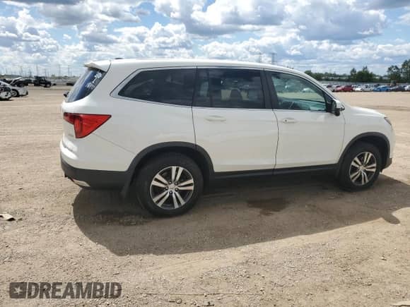 2017 Honda Pilot EX with VIN 5FNYF6H32HB058093, listed as a Copart auction lot 70226885 with 207,003 mi miles and Salvage title. Bid and sale history available at DreamBid. Image 3.