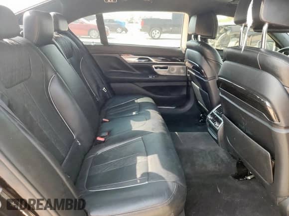 2016 BMW 7 Series 750i with VIN WBA7F0C53GGL99358, listed as a Copart auction lot 80313835 with 87,729 mi miles and Salvage title. Bid and sale history available at DreamBid. Image 10.