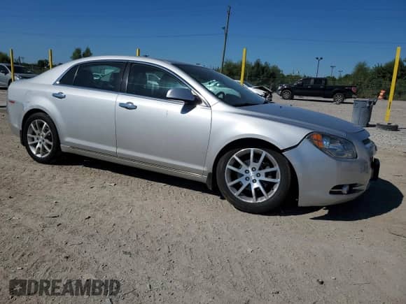 2012 Chevrolet Malibu LTZ 1LZ with VIN 1G1ZE5E0XCF254615, listed as a Copart auction lot 71444435 with 149,160 mi miles and Salvage title. Bid and sale history available at DreamBid. Image 4.