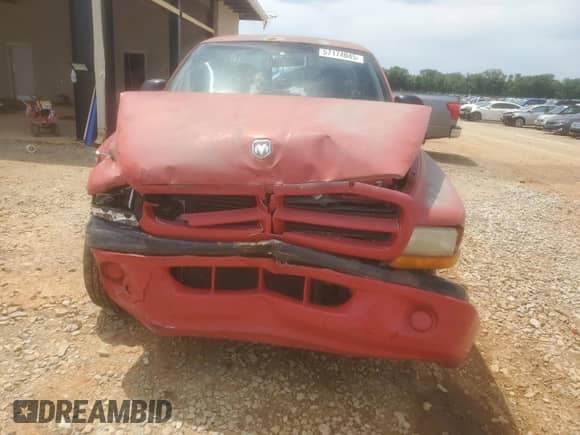 1998 Dodge Dakota SLT z VIN 1B7FL26X3WS605077, wystawiony jako Copart lot #57174045 z przebiegiem Nie podano mil oraz Szkoda całkowita • Salvage title. Historia ofert i sprzedaży dostępna na DreamBid. Obrazek 5.