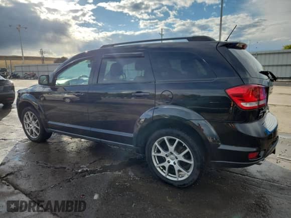 2012 Dodge Journey R/T with VIN 3C4PDDEGXCT230250, listed as a Copart auction lot 84048475 with 108,879 mi miles and Salvage title. Bid and sale history available at DreamBid. Image 2.
