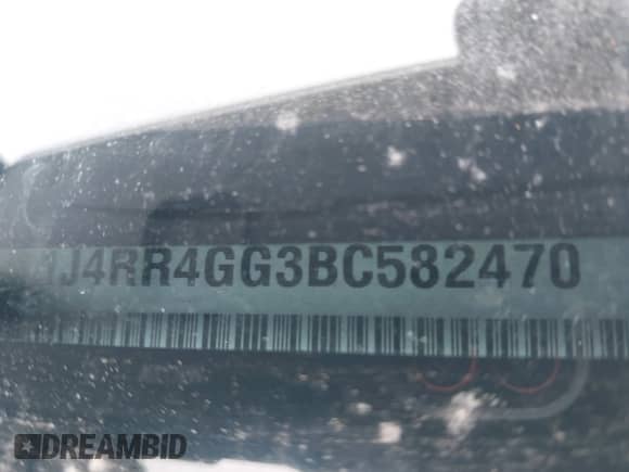 2011 Jeep Grand Cherokee 70th Anniversary with VIN 1J4RR4GG3BC582470, listed as a IAAI auction lot 42138291 with 241,429 mi miles and . Bid and sale history available at DreamBid. Image 15.