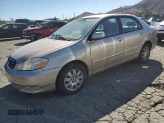 2004 Toyota Corolla CE z VIN 1NXBR32E94Z301126, wystawiony jako Copart lot #87467835 z przebiegiem 181 189 mil mil oraz Szkoda całkowita • Salvage title. Historia ofert i sprzedaży dostępna na DreamBid. Obrazek 1.