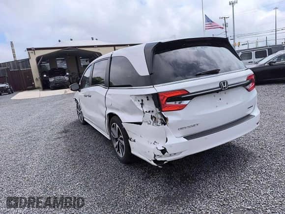 2023 Honda Odyssey Touring z VIN 5FNRL6H81PB008129, wystawiony jako Copart lot #90663075 z przebiegiem 57 273 mil mil oraz Czysty tytuł • Clean title. Historia ofert i sprzedaży dostępna na DreamBid. Obrazek 2.