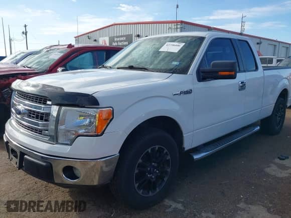 2013 Ford F-150 XL with VIN 1FTFX1CF7DKE02331, listed as a IAAI auction lot 42598406 with 213,131 mi miles and . Bid and sale history available at DreamBid. Image 2.