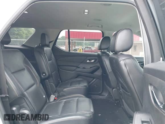 2018 Chevrolet Traverse Premier with VIN 1GNEVJKW7JJ218518, listed as a IAAI auction lot 42876202 with 105,178 mi miles and . Bid and sale history available at DreamBid. Image 8.