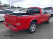 1999 Dodge Dakota SLT with VIN 1B7GL26Z5XS217114, listed as a IAAI auction lot 43418147 with 145,280 mi miles and . Bid and sale history available at DreamBid. Image 4.