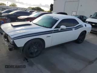 2012 Dodge Challenger R/T Plus with VIN 2C3CDYBT6CH142784, listed as a Copart auction lot 72089455 with 148,307 mi miles and Salvage title. Bid and sale history available at DreamBid. Image 1.