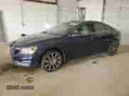 2015 Volvo S60 T6 Drive-E with VIN YV149MFK2F1341338, listed as a Copart auction lot 46083085 with 97,766 mi miles and Salvage title. Bid and sale history available at DreamBid. Image 1.