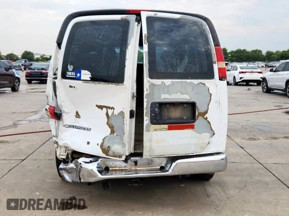 2008 Chevrolet Express Cargo with VIN 1GCFG154X81188880, listed as a Copart auction lot 70361085 with 327,309 mi miles and Salvage title. Bid and sale history available at DreamBid. Image 6.