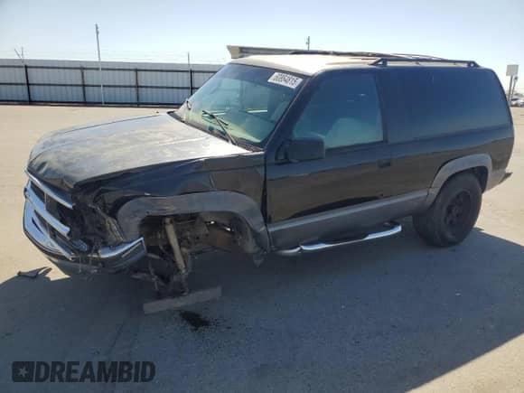 1996 Chevrolet Tahoe z VIN 3GNEK18RXTG158281, wystawiony jako Copart lot #60864815 z przebiegiem 286 142 mil mil oraz Szkoda całkowita • Salvage title. Historia ofert i sprzedaży dostępna na DreamBid. Obrazek 1.