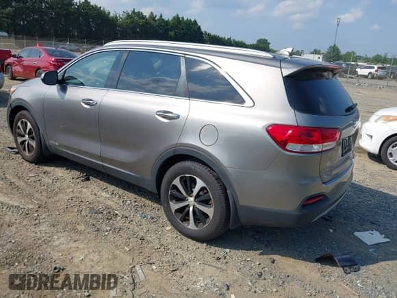 2016 Kia Sorento EX with VIN 5XYPHDA54GG163134, listed as a IAAI auction lot 42797501 with 128,490 mi miles and . Bid and sale history available at DreamBid. Image 3.