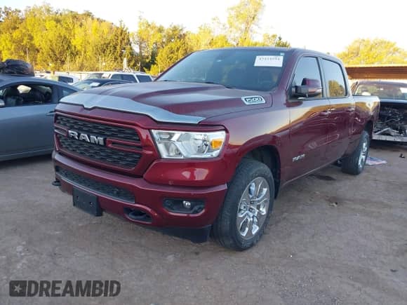 2024 Ram 1500 Big Horn with VIN 1C6SRFMT0RN209266, listed as a IAAI auction lot 43424594 with 25,117 mi miles and . Bid and sale history available at DreamBid. Image 2.