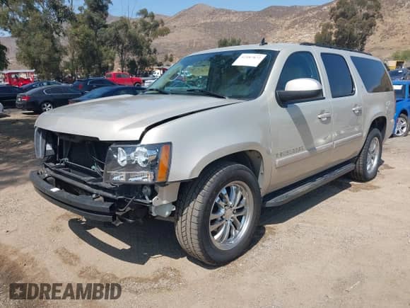 2007 Chevrolet Suburban LT with VIN 3GNFC16027G185275, listed as a IAAI auction lot 42587872 with 99,181 mi miles and . Bid and sale history available at DreamBid. Image 2.