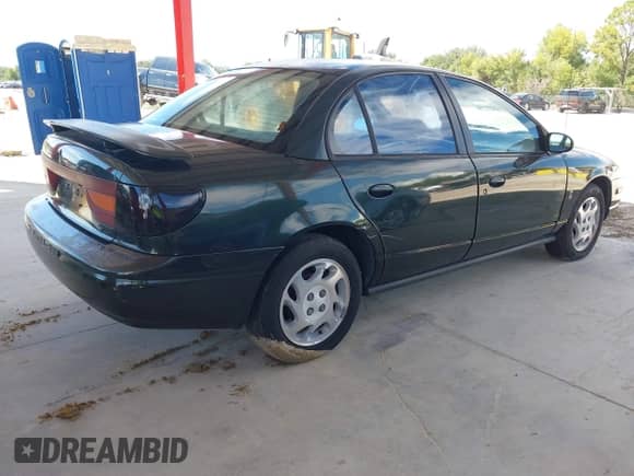 2000 Saturn SL with VIN 1G8ZK5276YZ217966, listed as a IAAI auction lot 43310131 with 69,028 mi miles and . Bid and sale history available at DreamBid. Image 4.