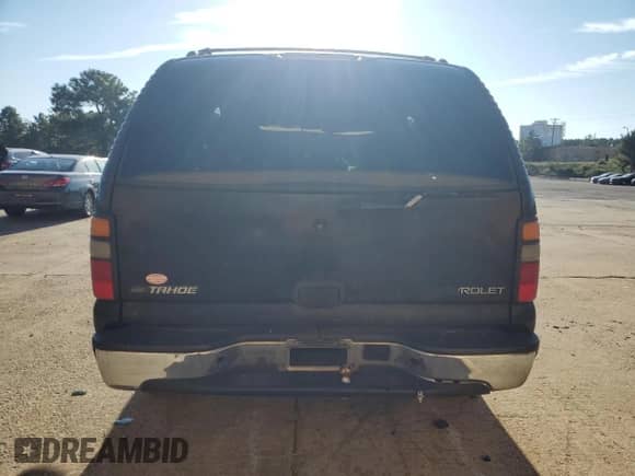 2004 Chevrolet Tahoe LS with VIN 1GNEC13V34J111076, listed as a Copart auction lot 70892775 with 303,811 mi miles and Salvage title. Bid and sale history available at DreamBid. Image 6.