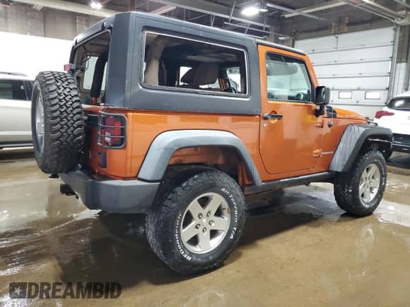 2011 Jeep Wrangler Rubicon with VIN 1J4BA6D11BL573772, listed as a Copart auction lot 70234365 with 118,181 mi miles and Clean title. Bid and sale history available at DreamBid. Image 3.