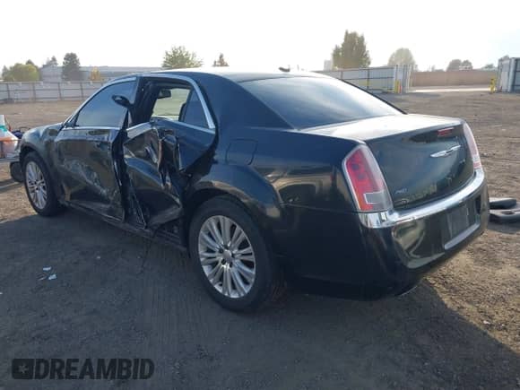 2013 Chrysler 300 with VIN 2C3CCARG5DH659840, listed as a IAAI auction lot 43548831 with 129,743 mi miles and . Bid and sale history available at DreamBid. Image 3.