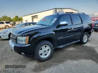 2008 Chevrolet Tahoe 3LT with VIN 1GNFK13068R145077, listed as a Copart auction lot 84806565 with 182,960 mi miles and Salvage title. Bid and sale history available at DreamBid. Image 1.