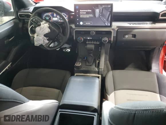 2024 Toyota Tacoma SR5 with VIN 3TYLB5JN8RT009946, listed as a Copart auction lot 62563025 with 17,752 mi miles and Salvage title. Bid and sale history available at DreamBid. Image 8.