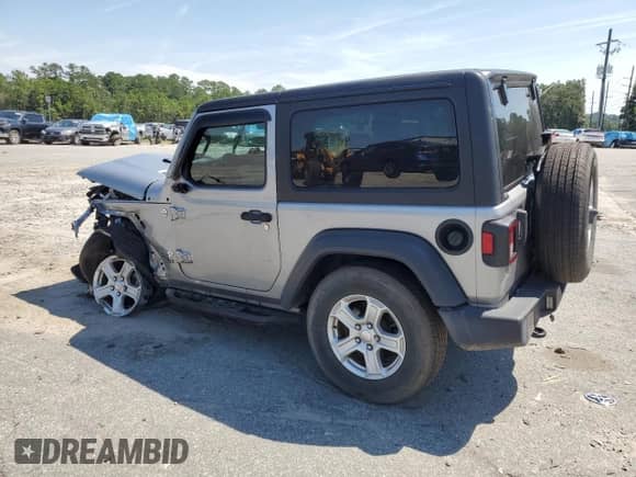 2020 Jeep Wrangler Sport S with VIN 1C4GJXAG8LW215563, listed as a Copart auction lot 70423945 with 69,559 mi miles and Salvage title. Bid and sale history available at DreamBid. Image 2.