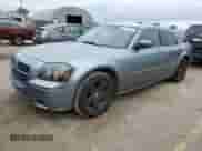 2007 Dodge Magnum with VIN 2D4FV47V67H744408, listed as a Copart auction lot 70767215 with 156,584 mi miles and Salvage title. Bid and sale history available at DreamBid. Image 1.