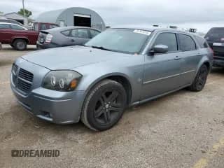 2007 Dodge Magnum with VIN 2D4FV47V67H744408, listed as a Copart auction lot 70767215 with 156,584 mi miles and Salvage title. Bid and sale history available at DreamBid. Image 1.