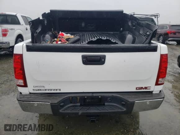 2012 GMC Sierra 1500 SLT z VIN 3GTP1WE0XCG133663, wystawiony jako Copart lot #43660325 z przebiegiem Nie podano mil oraz Nie do naprawy • Non repairable. Historia ofert i sprzedaży dostępna na DreamBid. Obrazek 6.
