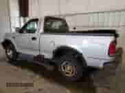 2003 Ford F-150 XL z VIN 1FTRF18273NB92414, wystawiony jako Copart lot #71539794 z przebiegiem Nie podano mil oraz Szkoda całkowita • Salvage title. Historia ofert i sprzedaży dostępna na DreamBid. Obrazek 2.