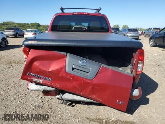 2006 Nissan Frontier LE z VIN 1N6AD07U26C454837, wystawiony jako Copart lot #84731125 z przebiegiem 172 958 mil mil oraz Szkoda całkowita • Salvage title. Historia ofert i sprzedaży dostępna na DreamBid. Obrazek 6.