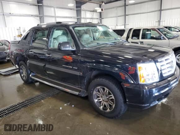 2004 Cadillac Escalade EXT with VIN 3GYEK62N64G298822, listed as a Copart auction lot 68871455 with 145,771 mi miles and Salvage title. Bid and sale history available at DreamBid. Image 4.