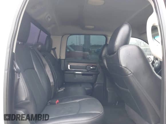 2018 Ram 1500 Laramie with VIN 1C6RR7NT3JS117772, listed as a IAAI auction lot 41336664 with 84,143 mi miles and . Bid and sale history available at DreamBid. Image 8.