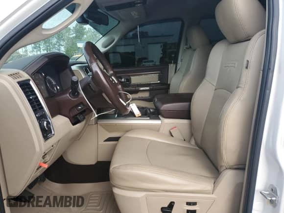 2015 Ram 1500 Laramie z VIN 1C6RR6NT2FS542353, wystawiony jako Copart lot #66445715 z przebiegiem 97 947 mil mil oraz Szkoda całkowita • Salvage title. Historia ofert i sprzedaży dostępna na DreamBid. Obrazek 7.