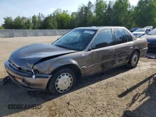 1992 Honda Accord с VIN 1HGCB7673NA130331, выставлен на аукционе Copart как лот 60263315 с пробегом 217 769 миль миль и Списание • Salvage title. История ставок и продаж доступна на DreamBid. Изображение 1.