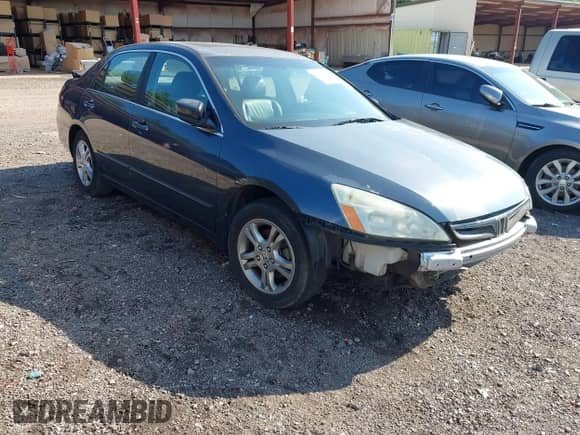 2006 Honda Accord EX with VIN 1HGCM56716A095448, listed as a IAAI auction lot 42457982 with 231,707 mi miles and . Bid and sale history available at DreamBid. Image 1.