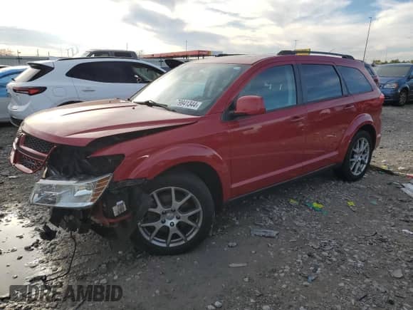 2012 Dodge Journey R/T with VIN 3C4PDDEG3CT297465, listed as a Copart auction lot 79941344 with 141,015 mi miles and Salvage title. Bid and sale history available at DreamBid. Image 1.