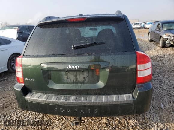 2010 Jeep Compass Latitude с VIN 1J4NF1FB4AD629252, выставлен на аукционе Copart как лот 83090274 с пробегом Не указан миль и Списание • Salvage title. История ставок и продаж доступна на DreamBid. Изображение 6.