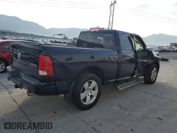 2012 Ram 1500 Express с VIN 1C6RD7FT8CS311777, выставлен на аукционе Copart как лот 70416035 с пробегом 130 119 миль миль и Списание • Salvage title. История ставок и продаж доступна на DreamBid. Изображение 3.