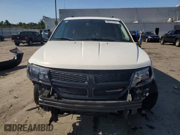 2019 Dodge Journey SE with VIN 3C4PDCBB8KT833943, listed as a Copart auction lot 68223735 with 144,158 mi miles and Salvage title. Bid and sale history available at DreamBid. Image 5.