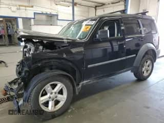 2007 Dodge Nitro SXT z VIN 1D8GU28K87W569479, wystawiony jako Copart lot #84258725 z przebiegiem 161 315 mil mil oraz Szkoda całkowita • Salvage title. Historia ofert i sprzedaży dostępna na DreamBid. Obrazek 1.