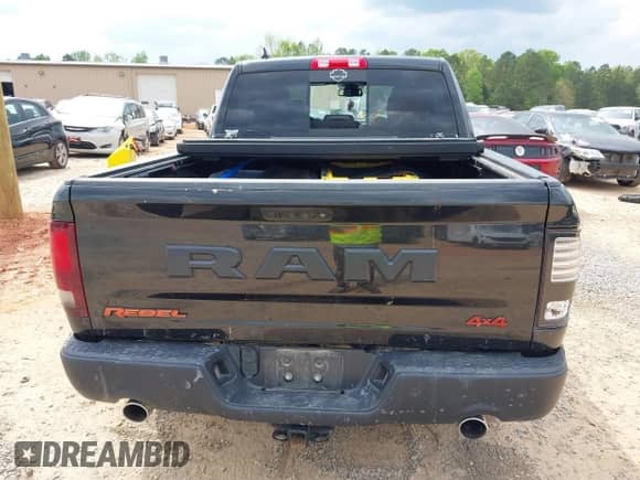 2018 Ram 1500 Rebel with VIN 1C6RR7YT4JS151036, listed as a IAAI auction lot 41988370 with 72,587 mi miles and . Bid and sale history available at DreamBid. Image 17.