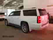 2018 Chevrolet Suburban Premier with VIN 1GNSKJKC2JR180229, listed as a Copart auction lot 84001115 with 144,207 mi miles and Clean title. Bid and sale history available at DreamBid. Image 2.