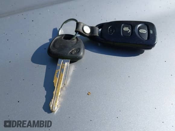 2008 Hyundai Tucson SE with VIN KM8JN12D18U811883, listed as a IAAI auction lot 43100051 with 211,694 mi miles and . Bid and sale history available at DreamBid. Image 11.