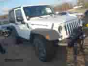2015 Jeep Wrangler Rubicon z VIN 1C4BJWCG0FL562795, wystawiony jako IAAI lot #41207703 z przebiegiem 97 922 mil mil oraz . Historia ofert i sprzedaży dostępna na DreamBid. Obrazek 1.