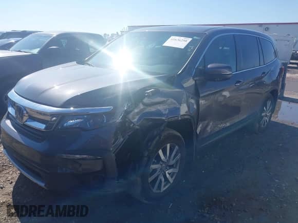 2020 Honda Pilot EX-L with VIN 5FNYF5H56LB003196, listed as a IAAI auction lot 41636258 with 76,868 mi miles and . Bid and sale history available at DreamBid. Image 18.