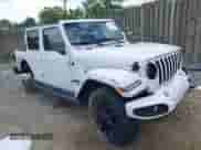 2021 Jeep Wrangler Unlimited Sahara High Altitude with VIN 1C4HJXEN6MW851686, listed as a IAAI auction lot 42214389 with 58,409 mi miles and . Bid and sale history available at DreamBid. Image 1.