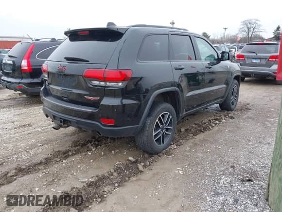 2019 Jeep Grand Cherokee Trailhawk z VIN 1C4RJFLT3KC554292, wystawiony jako IAAI lot #41953049 z przebiegiem 31 672 mil mil oraz . Historia ofert i sprzedaży dostępna na DreamBid. Obrazek 4.