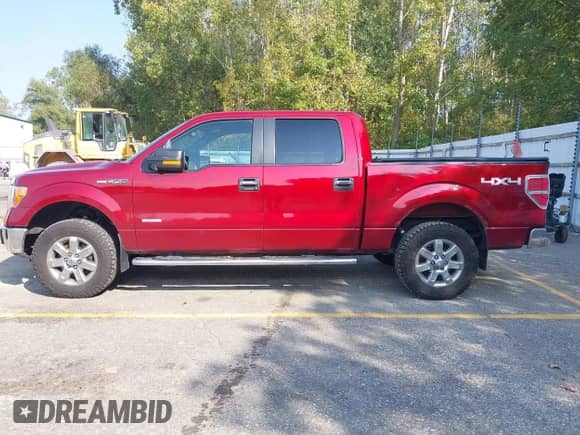 2013 Ford F-150 Lariat with VIN 1FTFW1ET5DKD04467, listed as a IAAI auction lot 43355676 with 124,871 mi miles and . Bid and sale history available at DreamBid. Image 14.