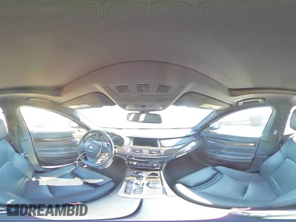 2014 BMW 7 Series 740Li с VIN WBAYE4C50ED137777, выставлен на аукционе Copart как лот 69148825 с пробегом 104 472 миль миль и Списание • Salvage title. История ставок и продаж доступна на DreamBid. Изображение 14.